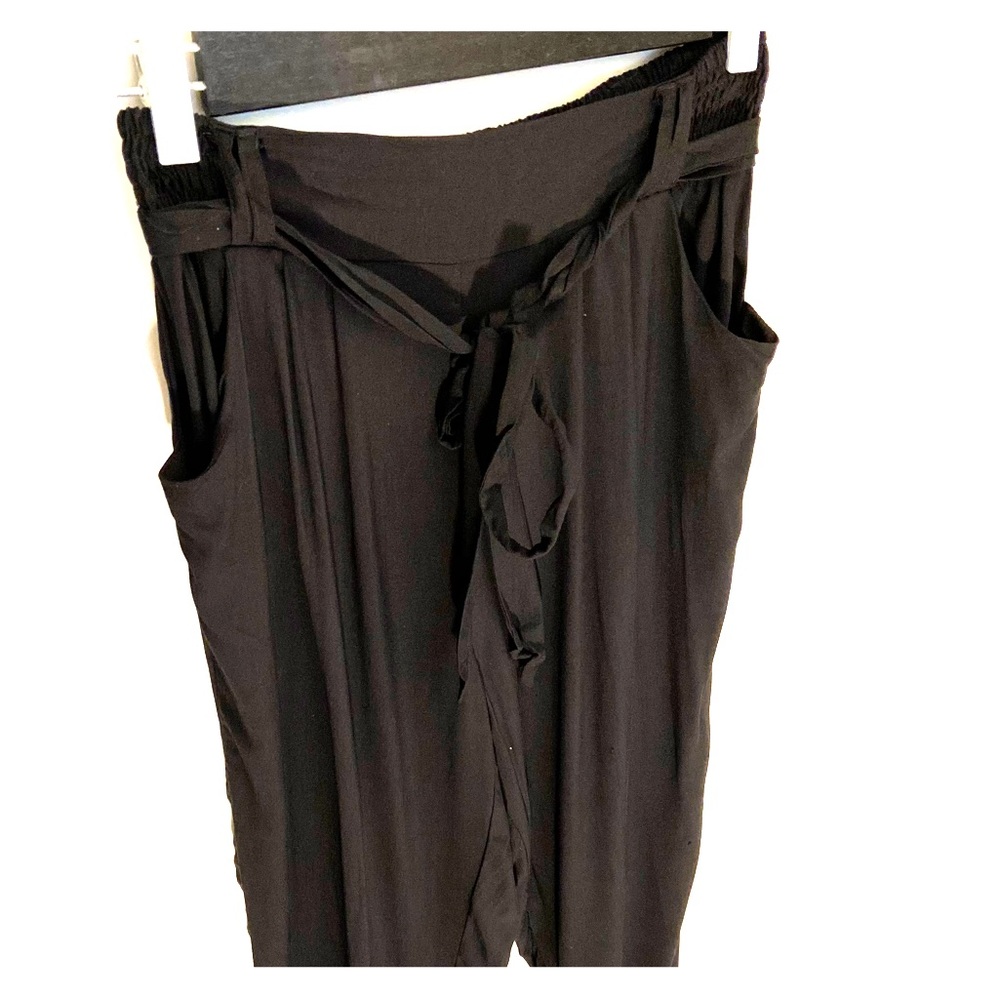 Black loose fitting pants with tie belt
